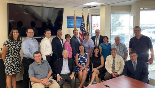 Chairman Daniel Maffie (rear, third from right) meets with members of the Association of Bi-State Motor Carriers, August 2022.